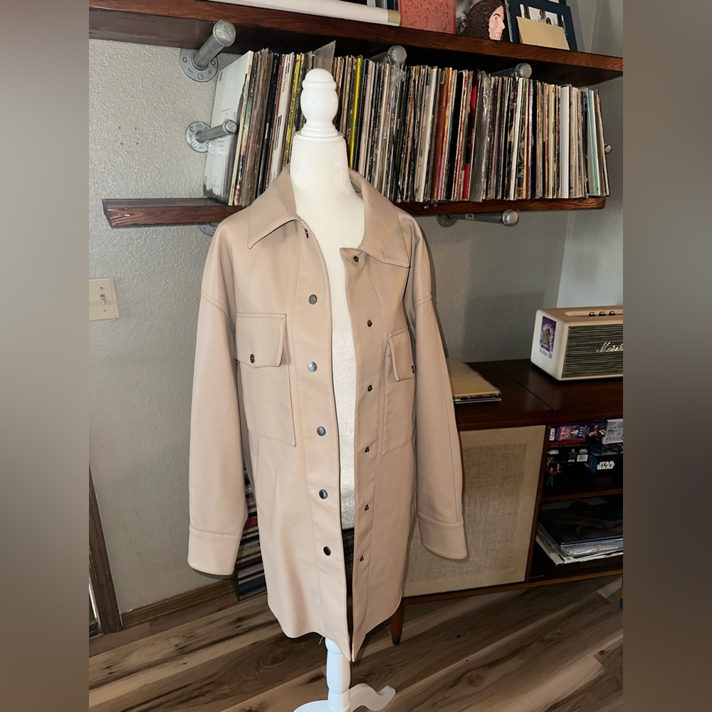 Beautiful BCBGMAXAZRIA real leather Jacket.  Super soft.  Only worn a few times.